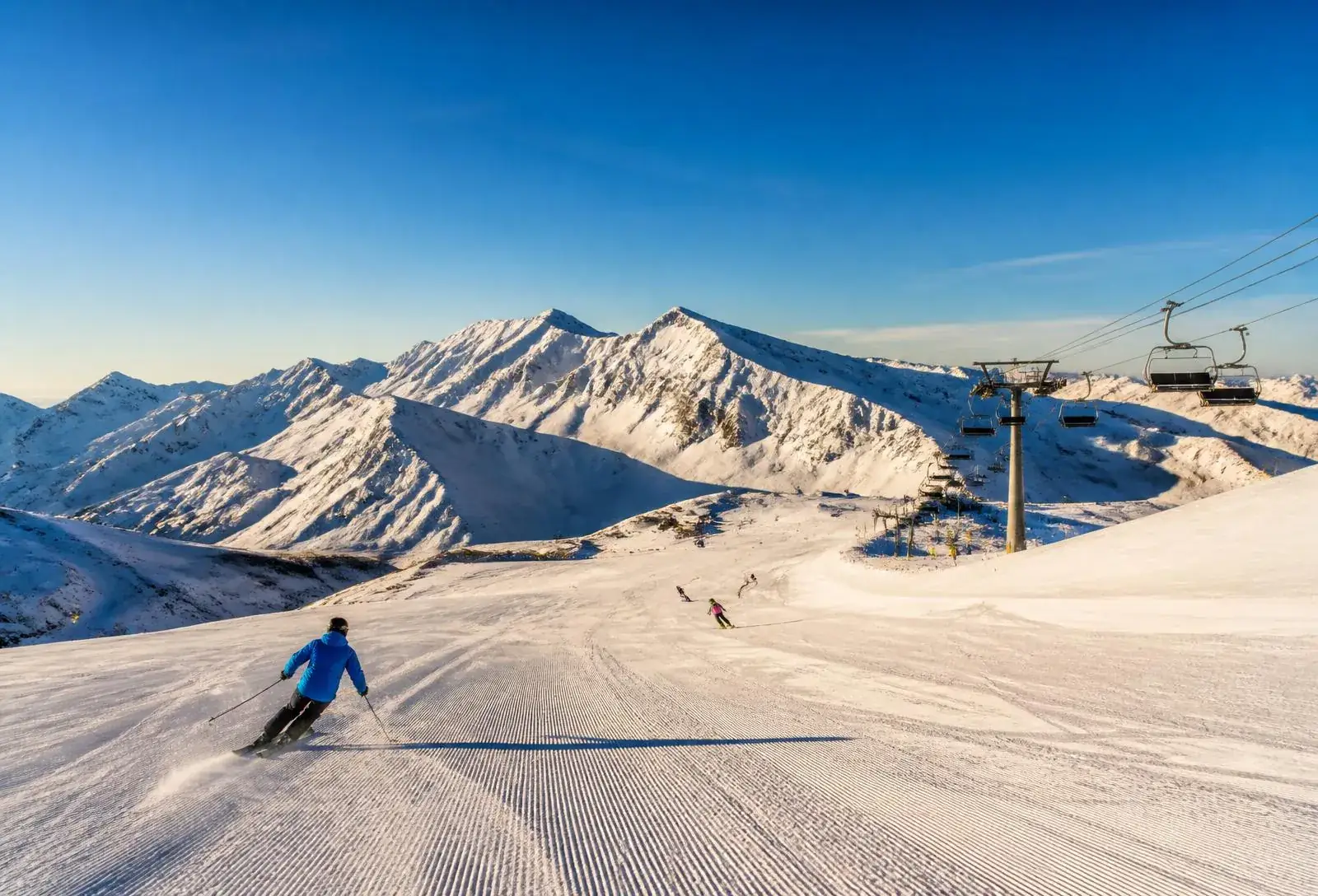 Groomed ski slopes and chairlift in the Sierra Nevada mountains