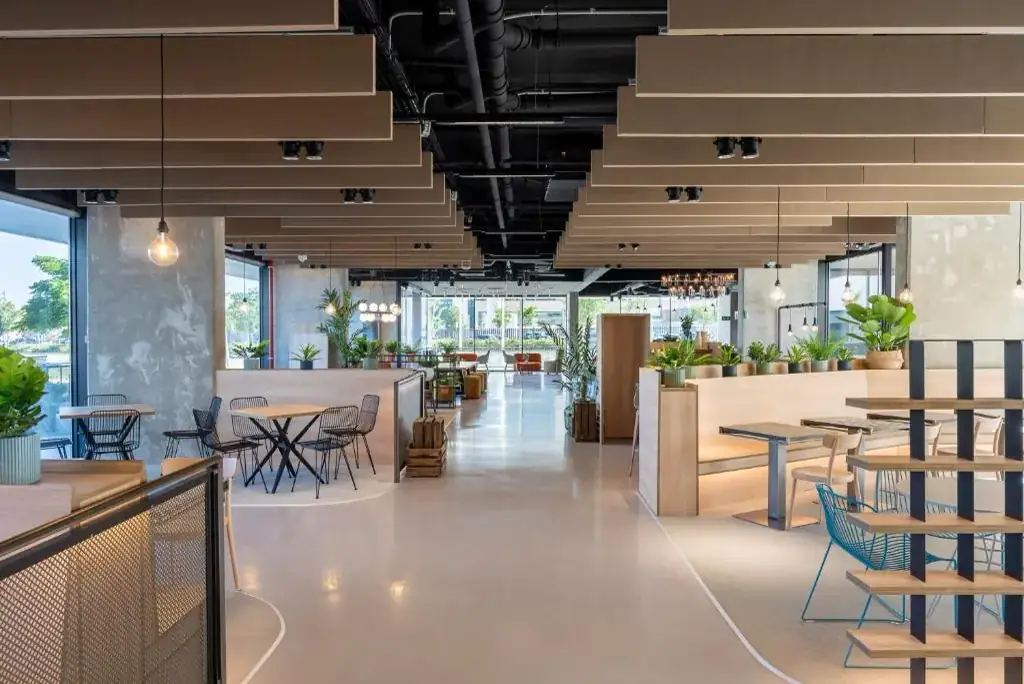 Coworking and shared lounge areas at Living Experience